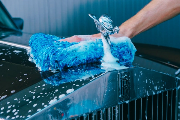 Car being washed with foam